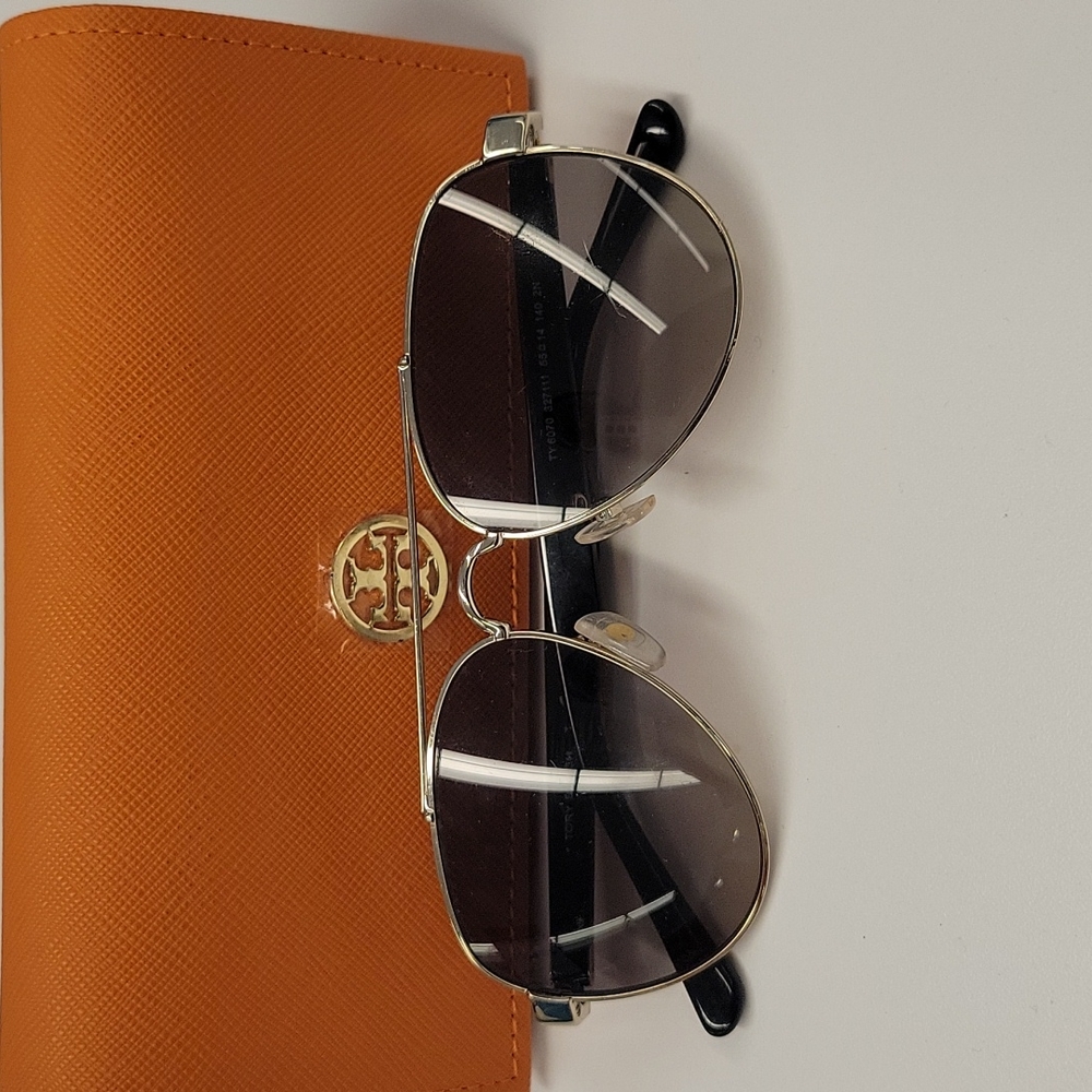 Tory Burch aviator sunglasses with gradient lenses. Make me an offer.